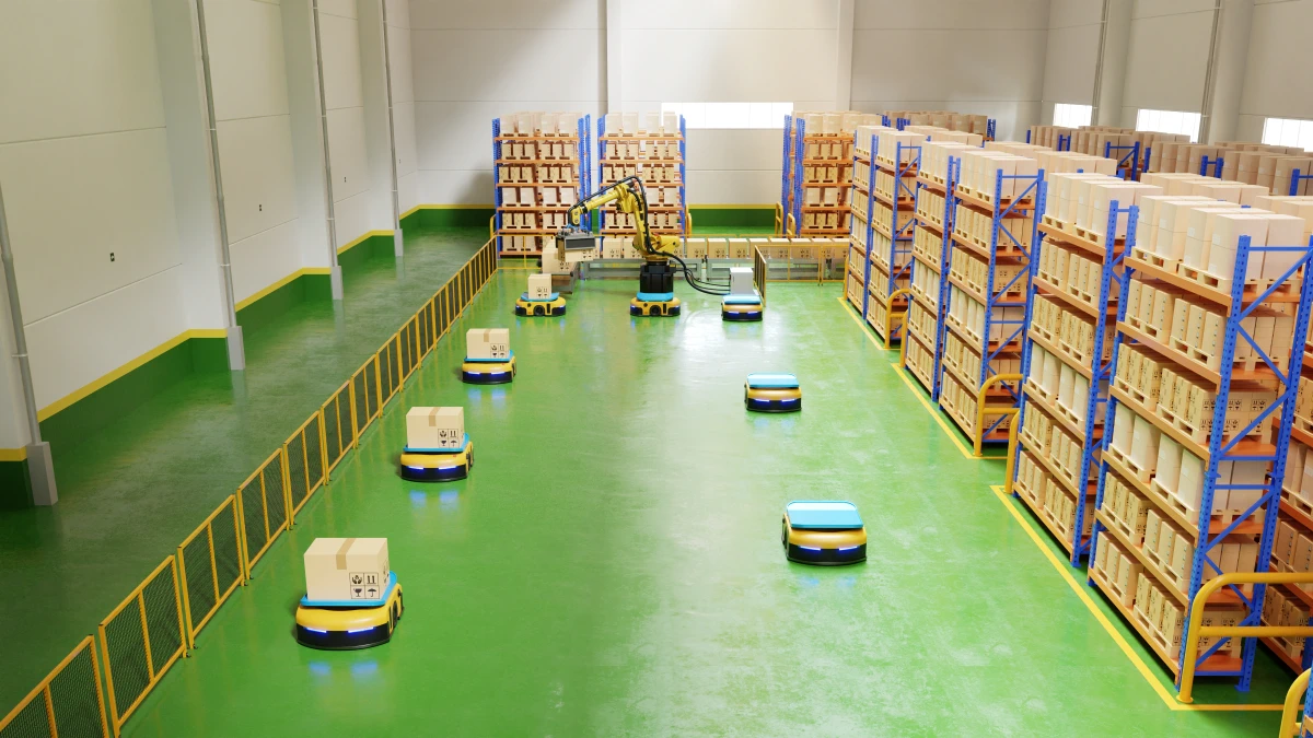 Fabrikautomatisierung mit FTS und Roboterarm im Transportwesen